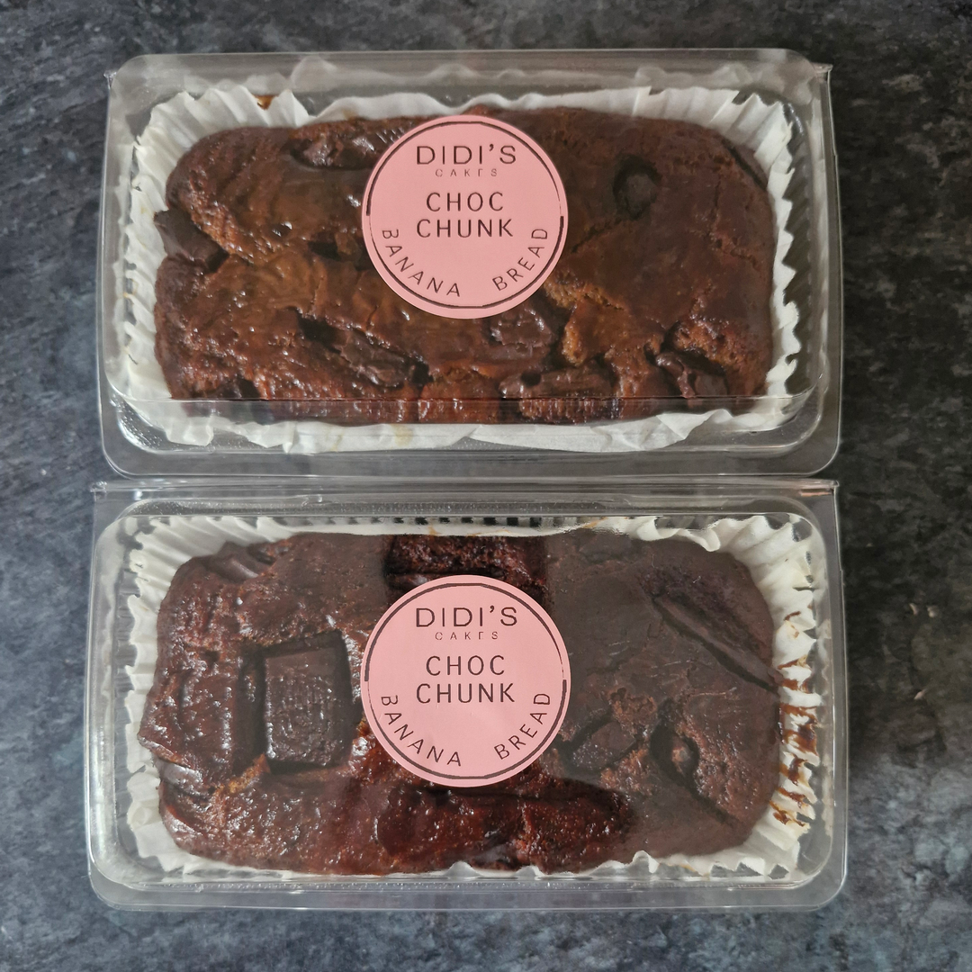 Two clear plastic clamshell packages of Didi&